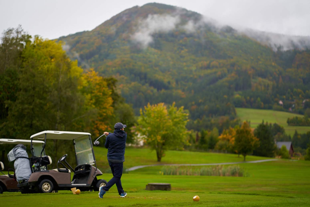 playing golf in the rain