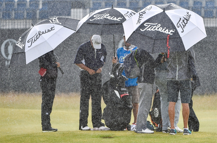 playing golf in the rain